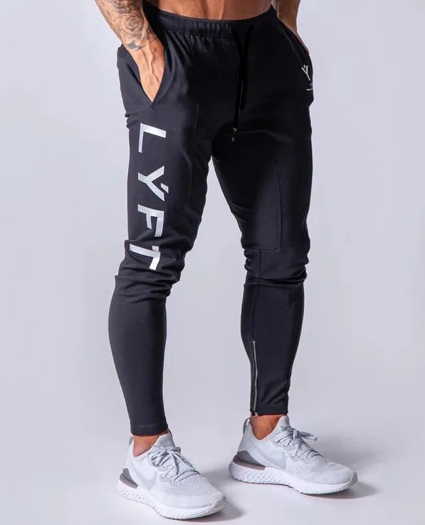 Новый Беговая Мужчины Спорт Sweatpants Бег Брюки GYM Брюки Мужчины Joggers Хлопок Trackpants Тонкий Fit Брюки Бодибилдинг для брюк