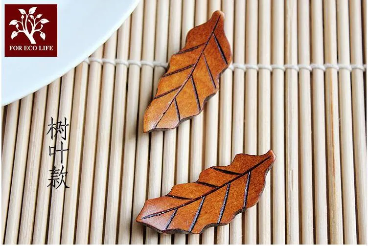 天然木の箸の残りのお箸棚の丸いスタンドドラッグピローの葉の魚の繊細な箸ナイフフォークスプーン