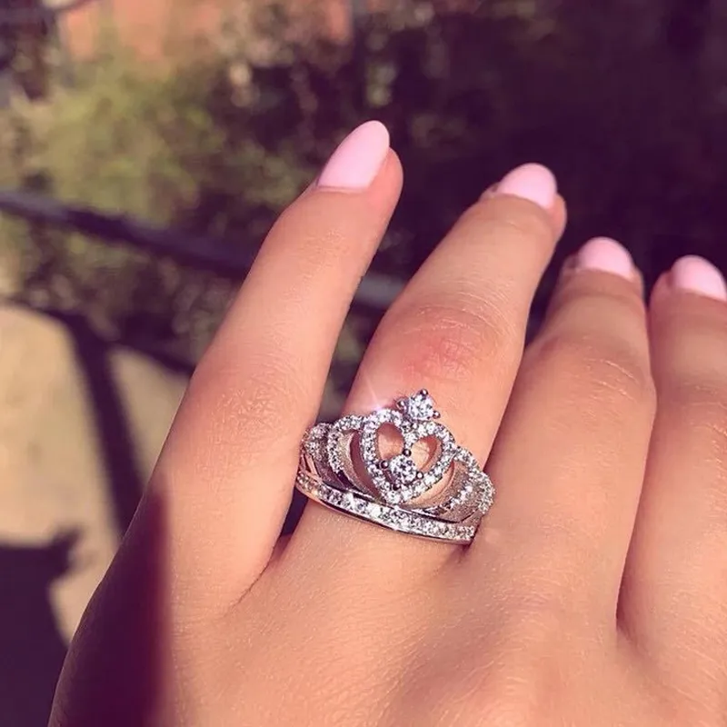 Princess crown ring on finger deals