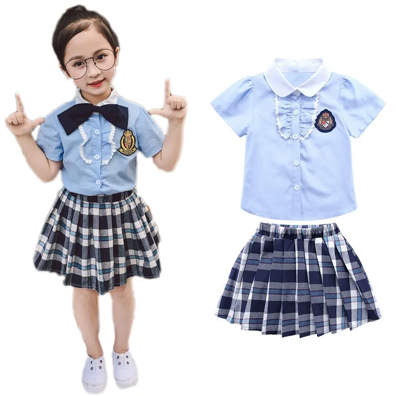 Moda Nueva camisa blanca + falda a cuadros Conjunto de ropa de 2 piezas Ropa de clase para niños y niñas Traje de diseñador para niños ropa para niñas
