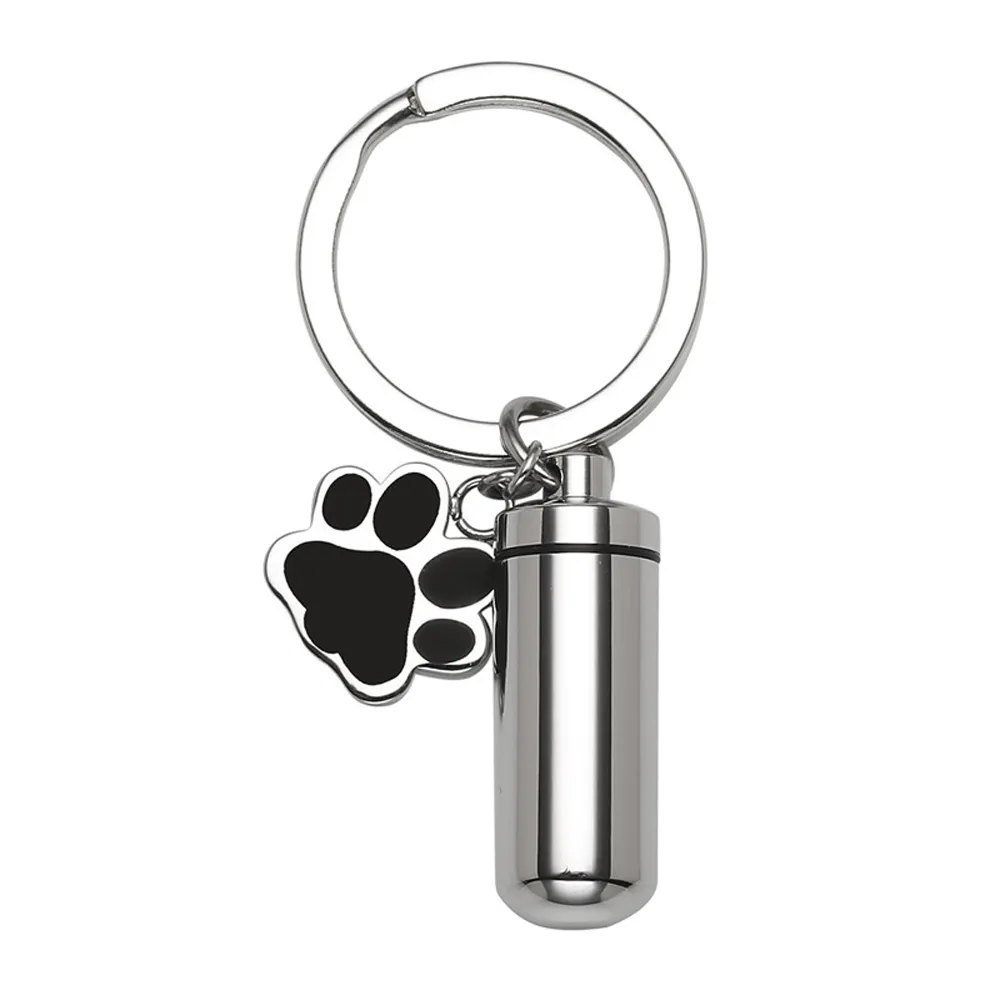 Urn Nyckelkedja Pet Cremation Smycken Charm Hund Paw Print Cylinder Memorial Urn Hängsmycke för Ashes Keepsake Smycken