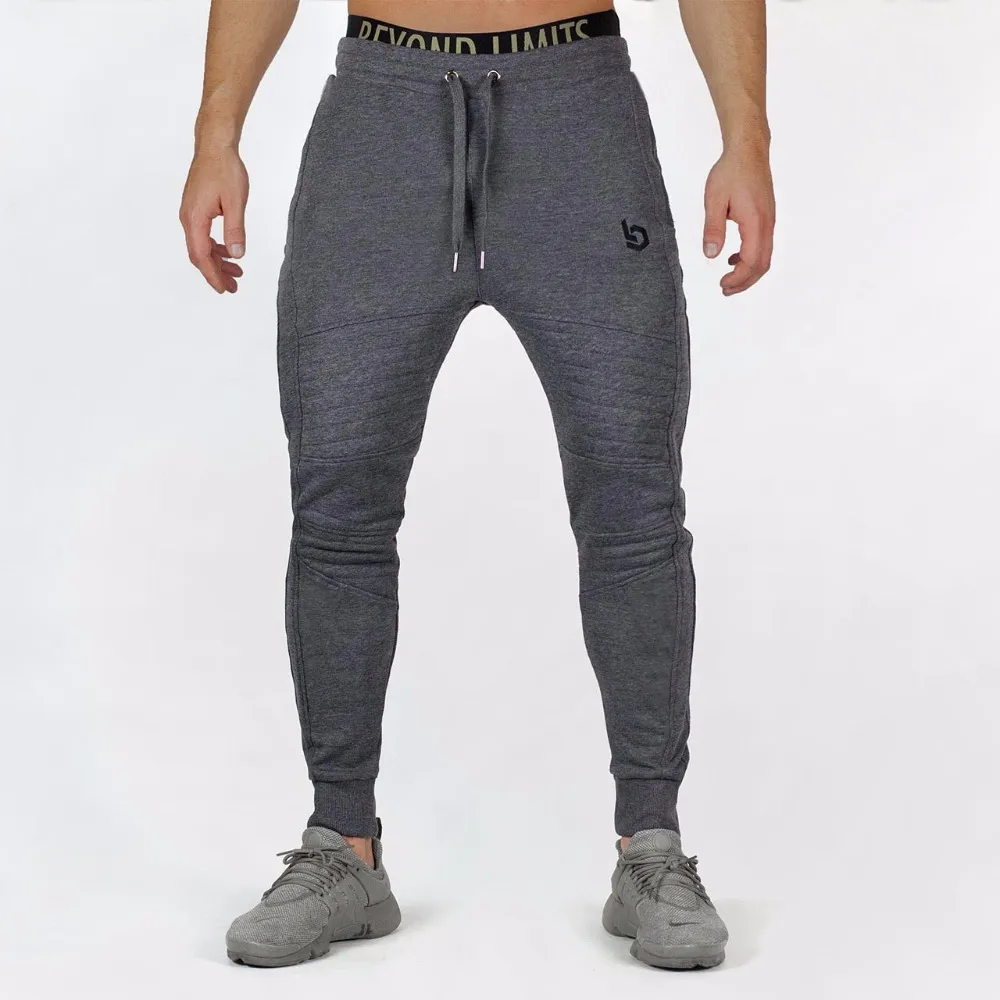 Mens Jogger Fitness Calças Casuais Estiramento Algodão Mens Fitness Exercício Bordado Calças De Esportes Calças Jogging Asiático Tamanho M-2XL