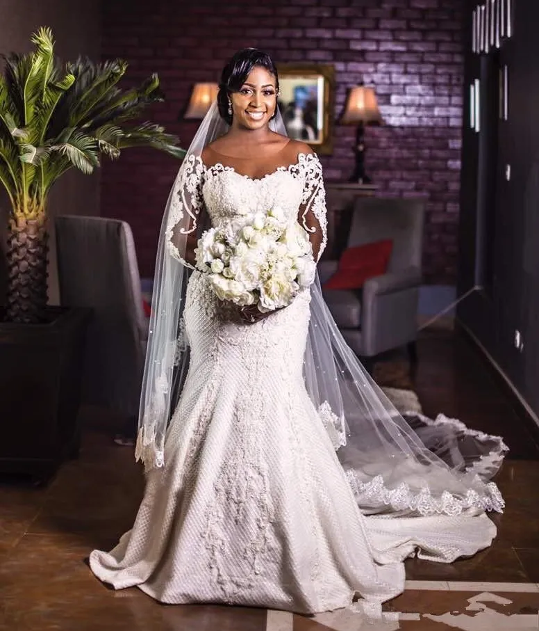 Mermaid Beaded Lace wedding dress with Sheer Bateau Neckline, Long Sleeves, and Sweep Train - Plus Size Trumpet Bridal Gown