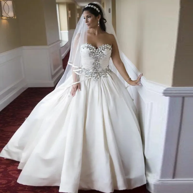 Abiti da sposa corpetto best sale brillantinato