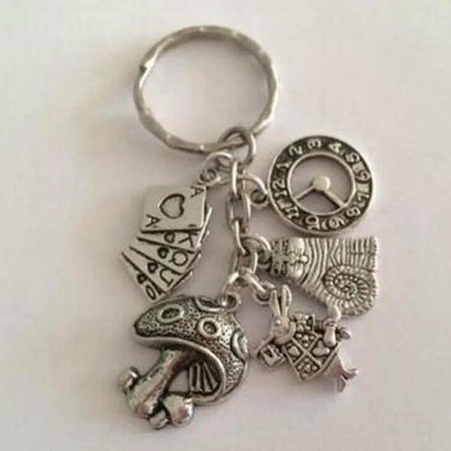 Alice In Wonderland Tema Charm Nyckelringar Presentplatering Silver Hänge 25mm Rund Split Keyrings Keychain Metal KeyRing Fashion 691