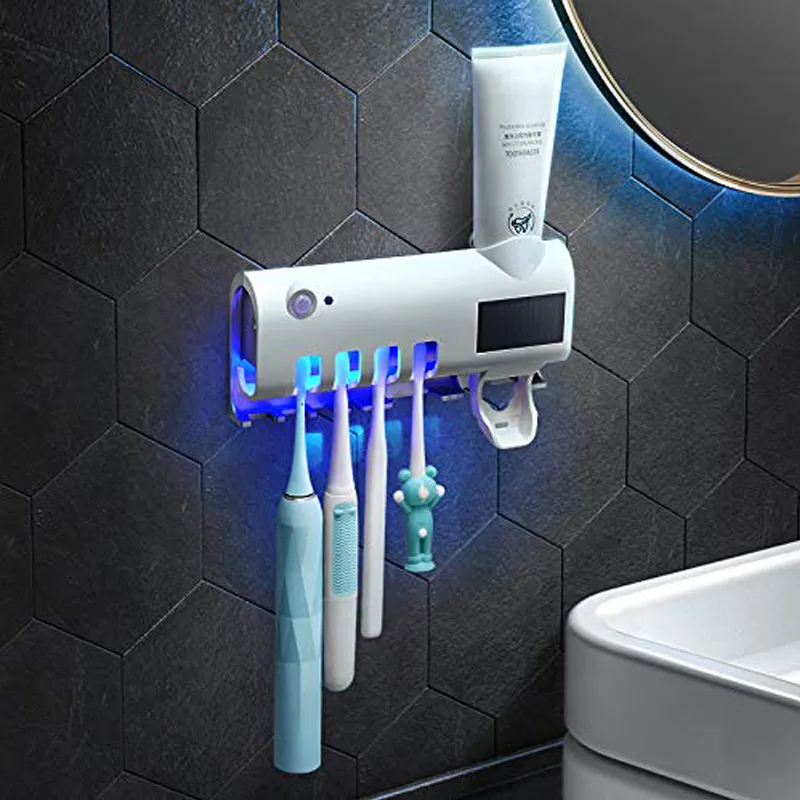 vendita all'ingrosso Sterilizzatore per spazzolino UV Ricaricabile a energia solare LED Disinfezione Portaspazzolino a parete Estrusione automatica di dentifricio