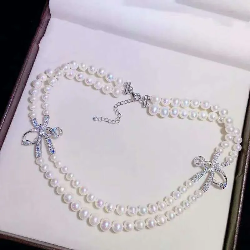 Incantevole collana di accessori in zirconi con micro intarsio di perle d'acqua dolce bianche a 2 file da 6-9 mm 45-47 cm