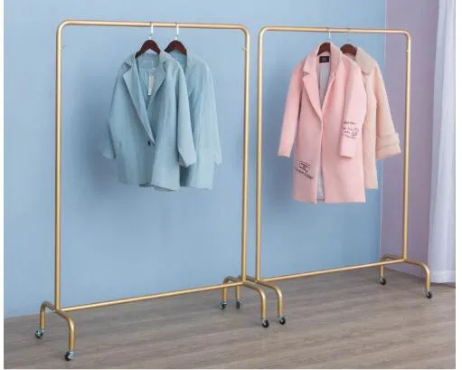 Klädaffär med remskiva rack sovrumsmöbler Kvinnors tyg Visa nano-guldhylla Rörliga hängande klädställ
