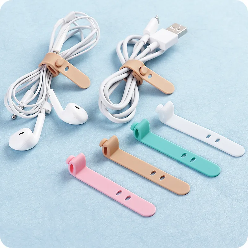 Mycket användbar 4PCS Silikonband Hook Loop Cable Winder Headphone Cord Earphone Arrangör och för iPhone Charger Protector