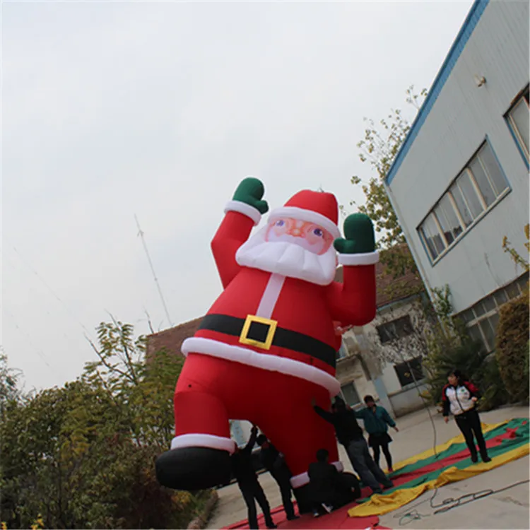 Großhandel 5 m hoher aufblasbarer Weihnachtsmann im Freien mit Aufhängung für die Außenwand des Einkaufszentrums Weihnachtsdekoration