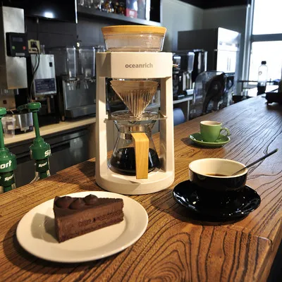 Gratis frakt Rostfritt stål Roterande kaffebryggare Simulerad handstansad Automatisk espressomaskin Kaffekanna Automatisk kaffemaskin