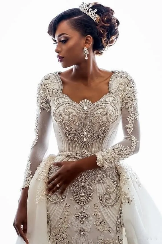 Long sleeve sheath on sale wedding dress with beading
