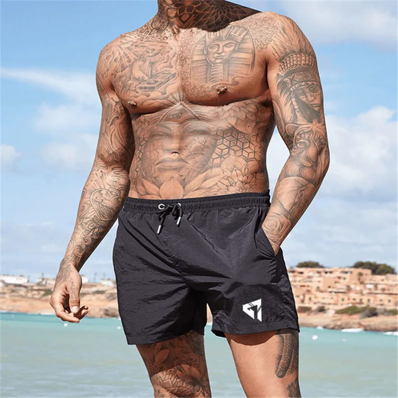 YEMEKE-2019-Beach-Shorts-Mens-casual-shorts-compress-Quick-drying-fashion-men-shorts-bermuda-Fitness-shorts.jpg_640x640 (4)