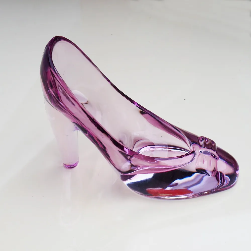 High Heel Shoe Through Broken Glass Window. Stock Photo, Picture and  Royalty Free Image. Image 35741987.