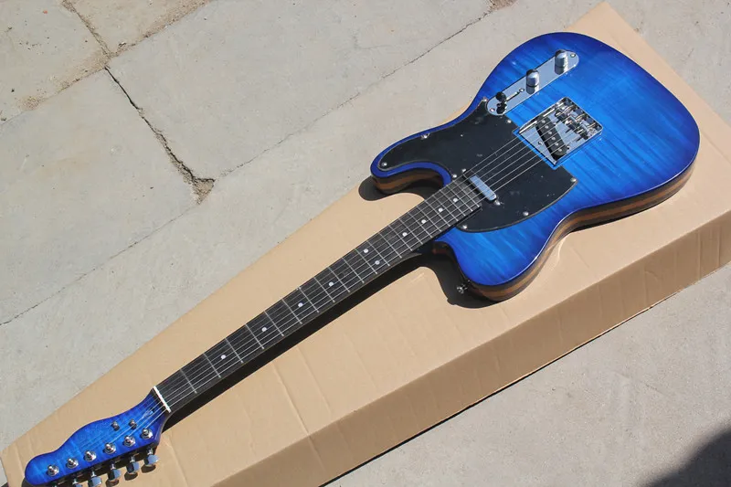 Guitare bleue personnalisée en usine avec panneau de protection noir et plaque de doigt en bois de rose, peut être personnalisée selon les besoins.