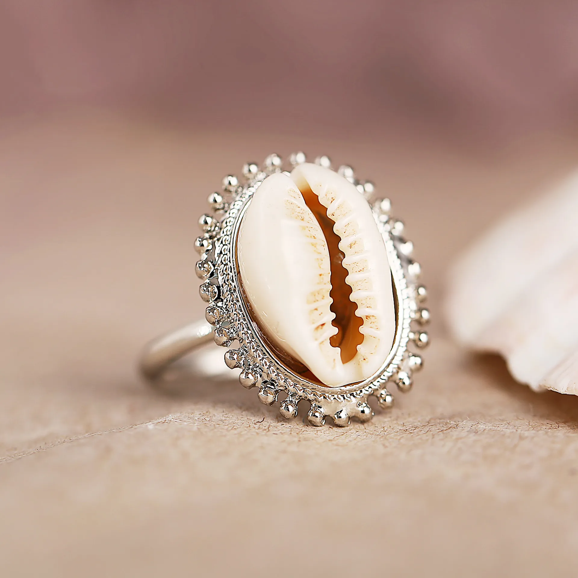 Anello sales con conchiglia