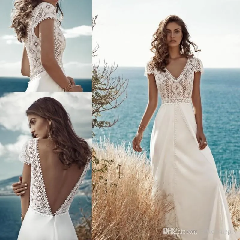 Tanie Bohemian Beach Lace Suknie ślubne Plus Size Deep V Neck Backless Aplikacja Sweep Pociąg Suknie Ślubne Suknie ślubne Robe de Mariée