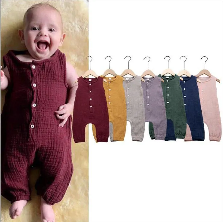 Baby rompers spädbarn solid ärmlös jumpsuits toddle bomull linne onies knappar klättra kostym sommar casual bodysuit overall kläder c5856