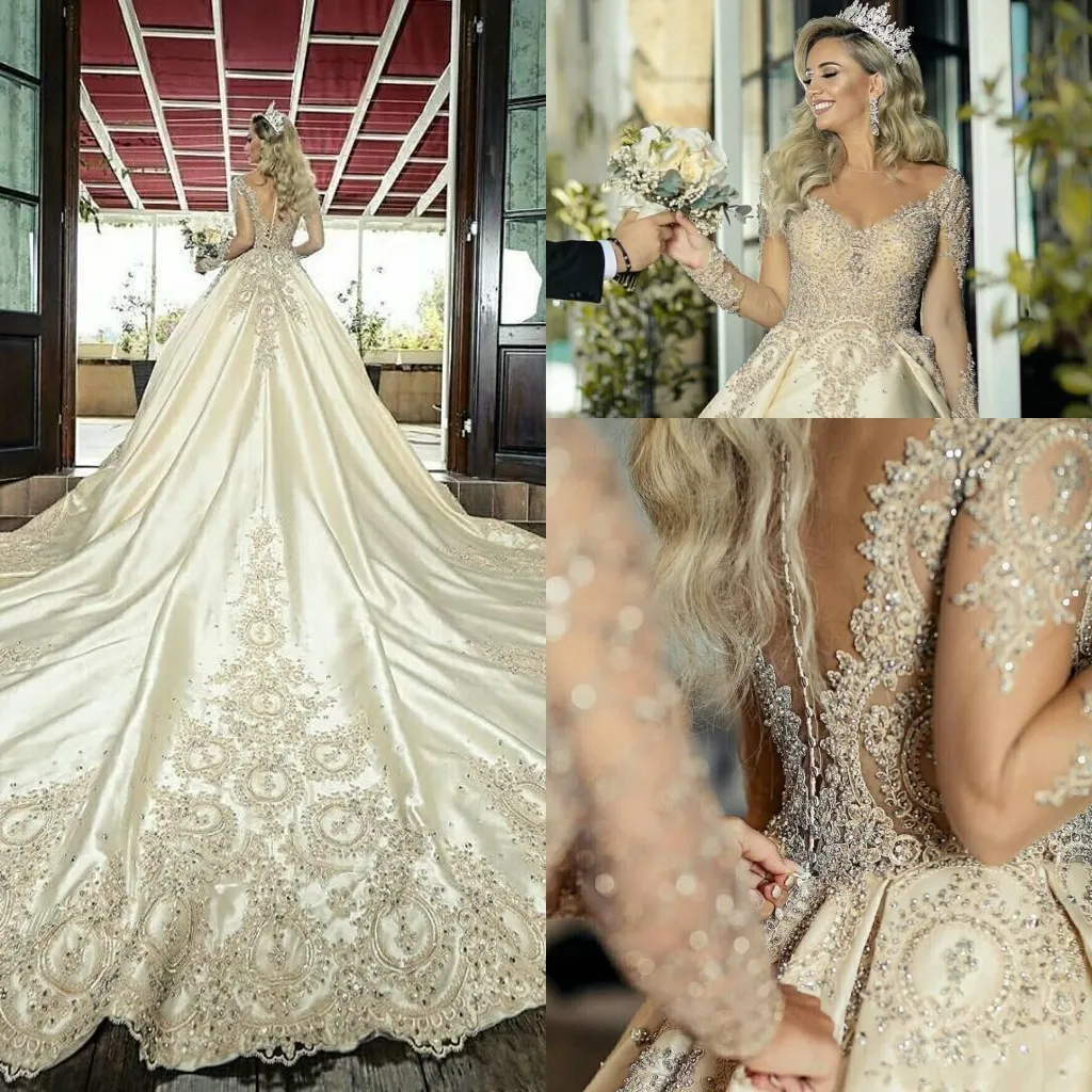 Sexy Champagne New Wedding Dresses A Line Jewel Neck Long Sleeves Lace Illusion Crystal Beads Chapel Train Plus Size Formal Bridal Gowns