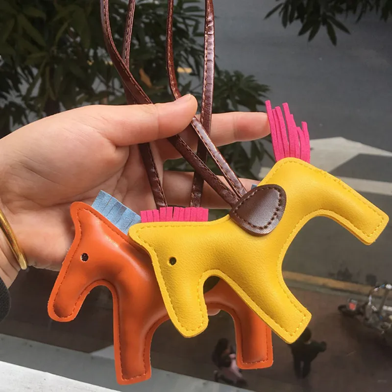 Fashion keychain designer PU leather pony keychain bag pendant handmade hand-stitched leather tassel pony keychain