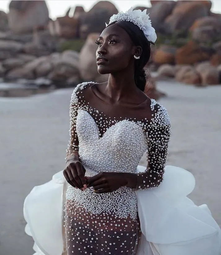 mermaid wedding dresses for black brides Black layered mermaid wedding dress with Pearls, Detachable Train, Ruffles, Tiered See-Thru, and Long Sleeves - Bridal Gown for Black Girls
