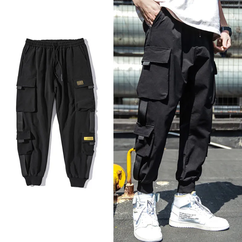 Diseñador de la marca Spring Hip Hop Joggers Hombres Pantalones Harem Negros Cintas multibolsillos Hombre Pantalones de chándal Streetwear Casual Mens Cargo Pants278V