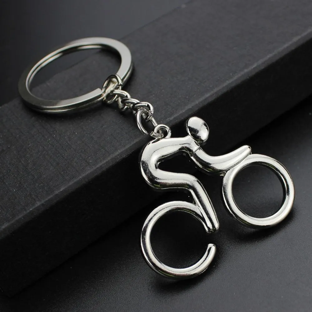 20 pçs / lote metal equitação bicicleta keychain moda esportes chaveiros chaveiro homem saco de homem pingentes charme feminino acessório jóias por atacado