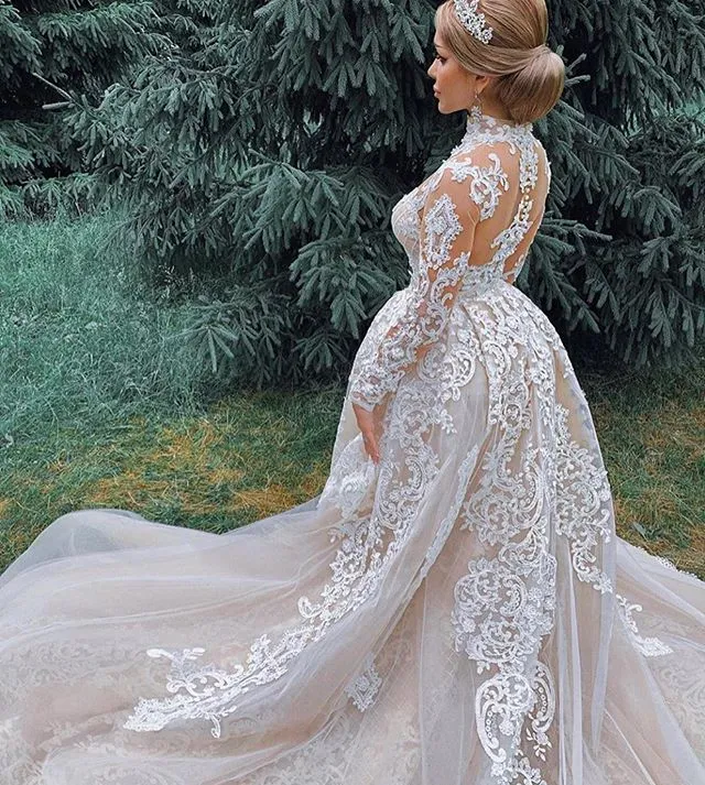 Arabic Dubai Arabic mermaid wedding dress with Illusion Lace Appliques, Crystal Beads, and High Neckline in Champagne Arabic Dubai Arabic mermaid wedding dress with Illusion Lace Appliques, Crystal Beads, and High Neckline in Champagne
