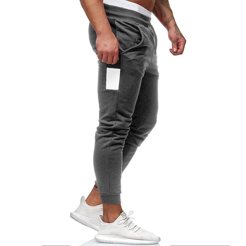 Pantaloni da jogging da uomo di nuova moda pantaloni sportivi in cotone allentati in vita elastica pantaloni lunghi casual maschili taglia asiatica197u