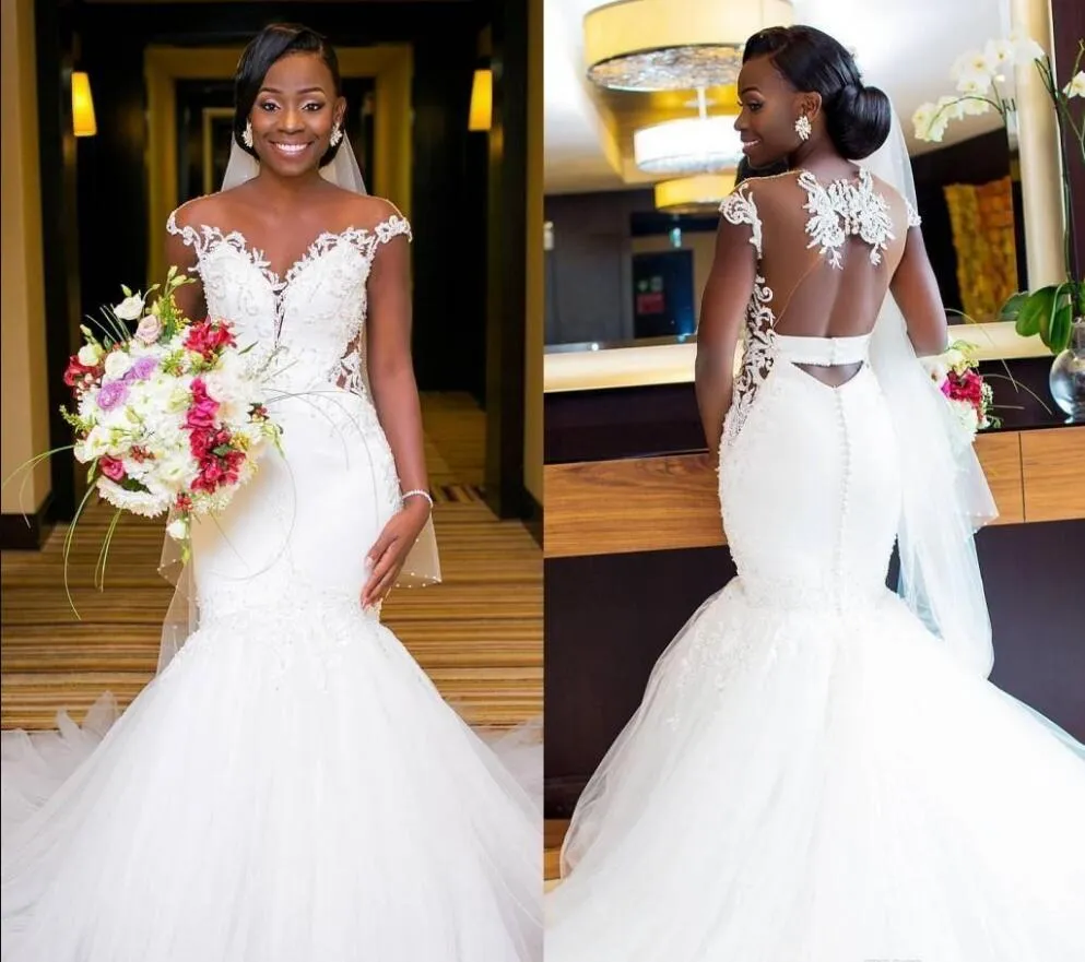 Nuovo arrivo Abiti da sposa a sirena africana 2019 Illusion Backless Applique Pizzo Corte dei treni Abito da sposa a sirena Abiti da sposa Taglie forti