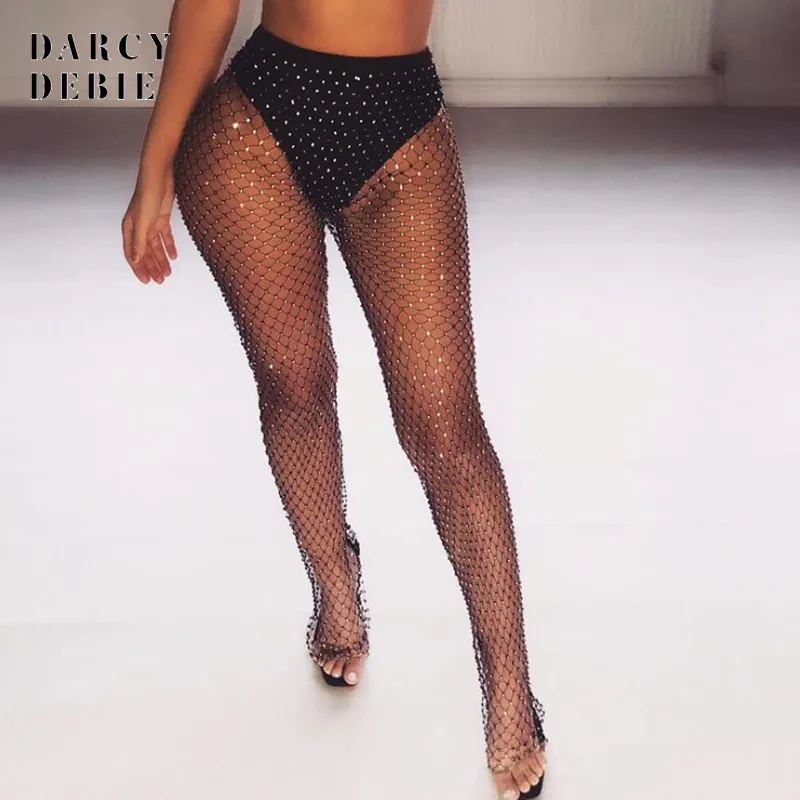 Darcydebie Black Diamonds Pantaloni a rete sexy Pantaloni da donna con strass in cristallo Scava fuori i pantaloni trasparenti da beach club party Y19070301