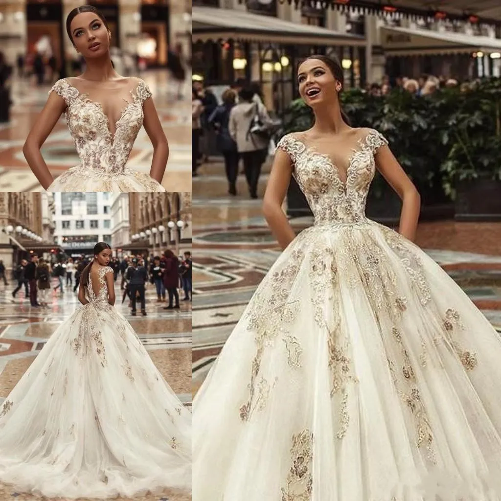 African Lace Ball Gown Wedding Dresses 2019 Illusion Cap Sleeves Boho Beach Bridal Gowns Buttons Back Wedding Dress Robe De Mariée