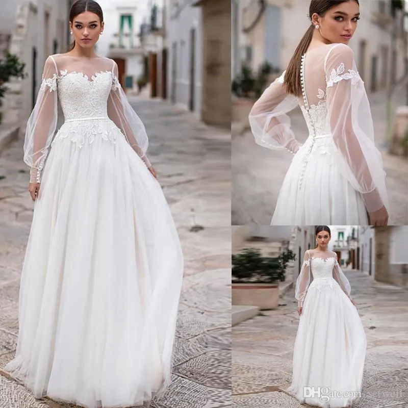 Gioiello Sheer Setwell Neck Abiti a trapezio Maniche lunghe Applicazioni in pizzo Tulle plissettato Lunghezza pavimento Abito da sposa Abiti da sposa con cintura