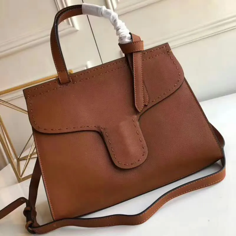 Lady çanta çantalar cüzdan çanta klasik yüksek kaliteli metal parçaları inek derisi hakiki deri düz bayan crossbody çanta ücretsiz kargo düz