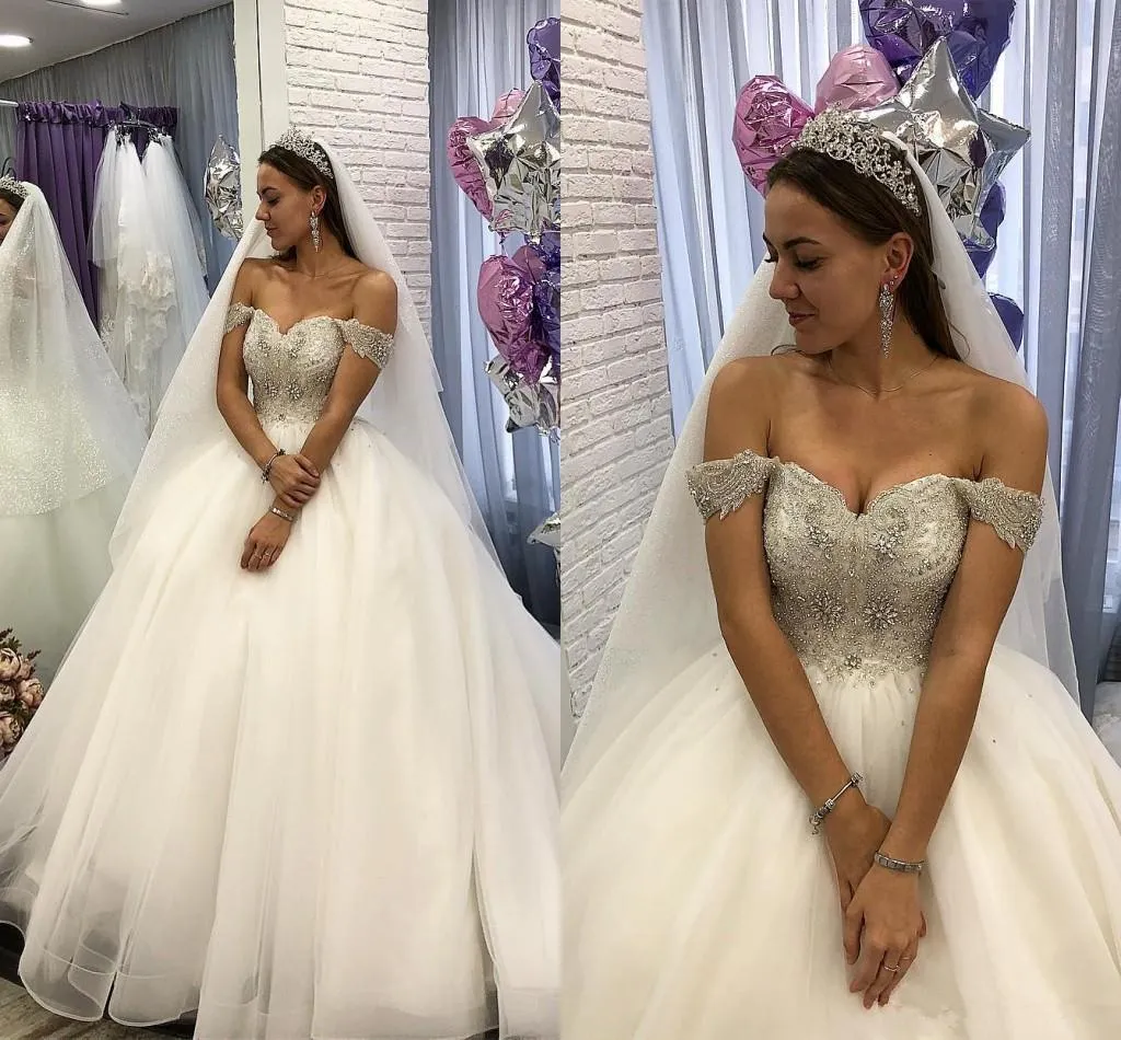 2020 New Bling Ball Gown Abiti da sposa con spalle scoperte Maniche ad aletta con perline di cristallo Princess Court Train Puffy Plus Size Abiti da sposa senza schienale