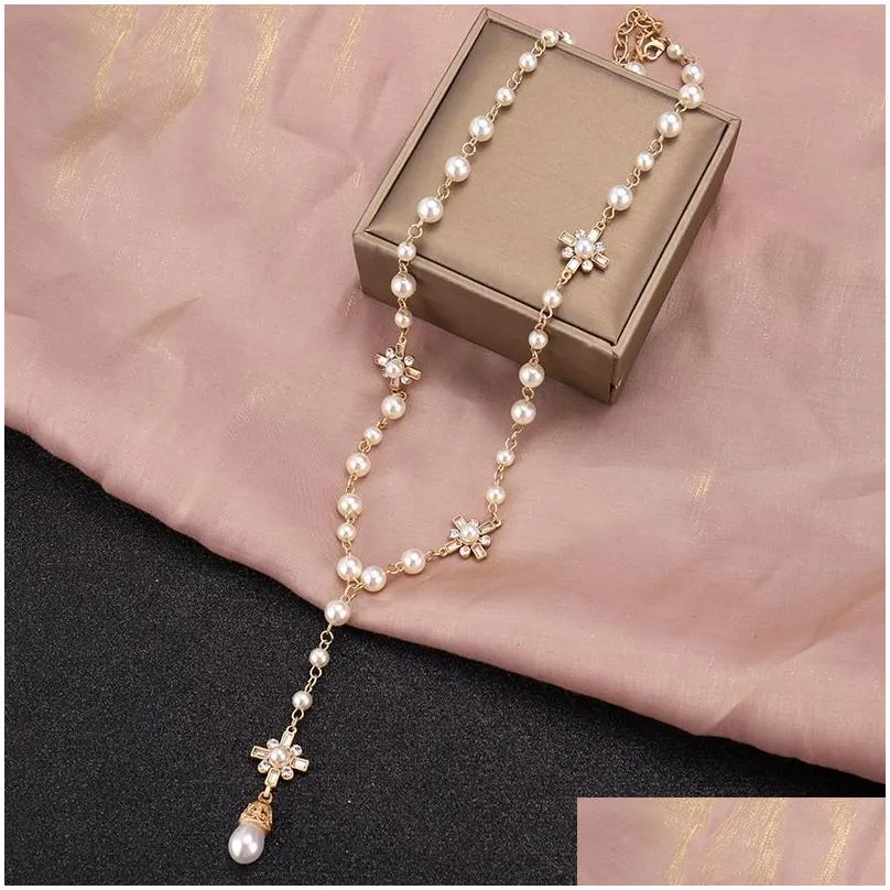 New necklace women039s long Korean Fashion Pendant with European and American famous pearl sweater Necklace9887024