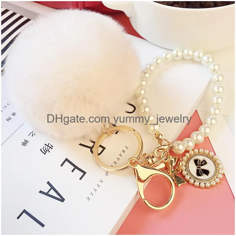 Fashion Pearl Chain Crystal Bow Pompom Keychain Car Women Handbag Key Ring Fluffy Puff Ball Keychains Jewelry Drop Delivery Dhdbs