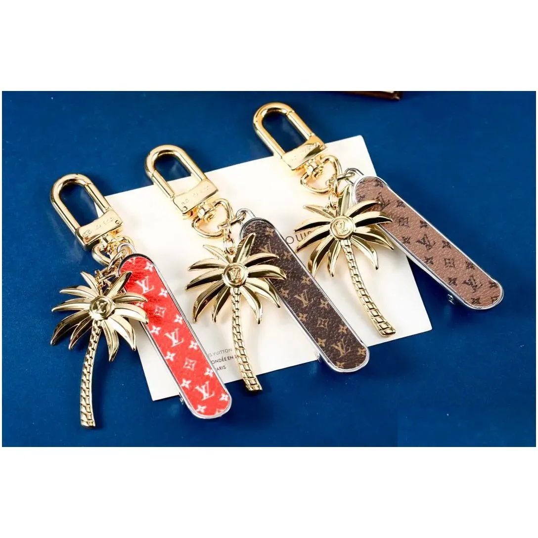 Fashion Luxury Coconut Designer Keychain Tree And Skateboard Elements Combination Trend Metal Key Chain Bow Car Pendant Personality D Dh8Yd