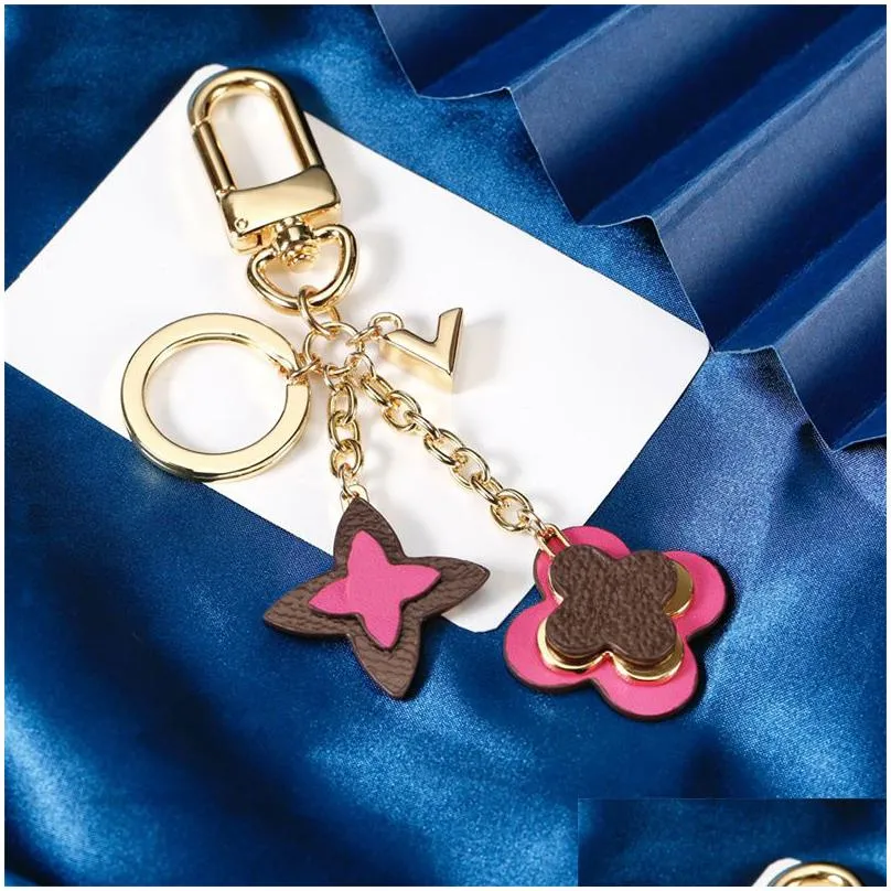 Fashion Luxury Keychains Men Designer Car Key Chain Women Bags Lovers Keyrings Golden Buckle Chains Letters Lock Drop Delivery Dhlla