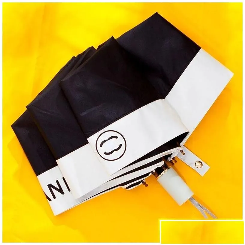 Umbrellas Luxury Matic Sun Rain Folding Designer Umbrella Drop Delivery Home Garden Housekee Organization Gear Dhv3Q