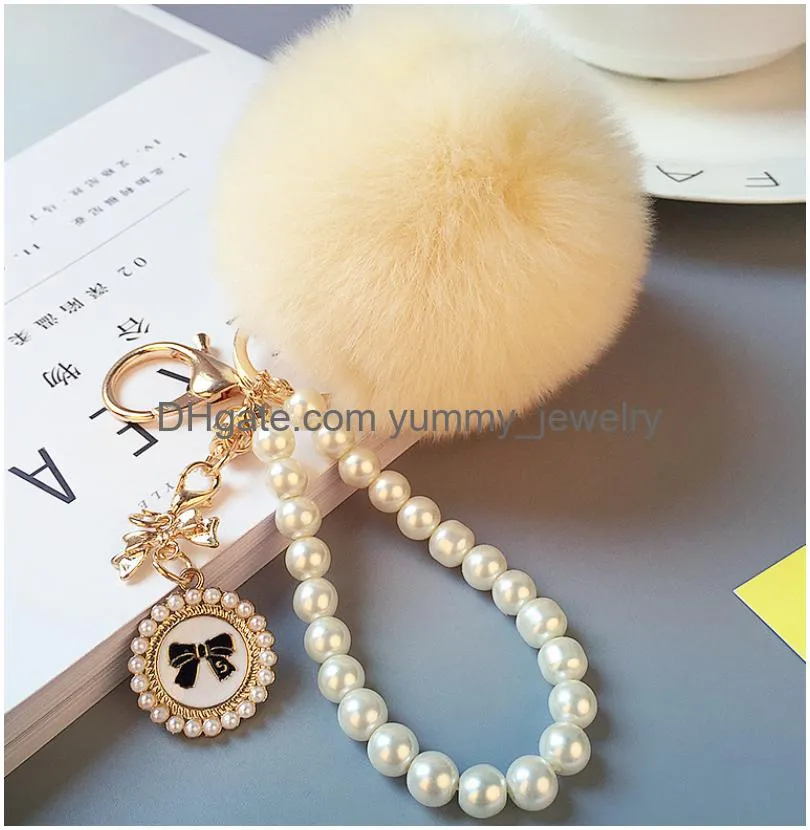 Fashion Pearl Chain Crystal Bow Pompom Keychain Car Women Handbag Key Ring Fluffy Puff Ball Keychains Jewelry Drop Delivery Dhdbs