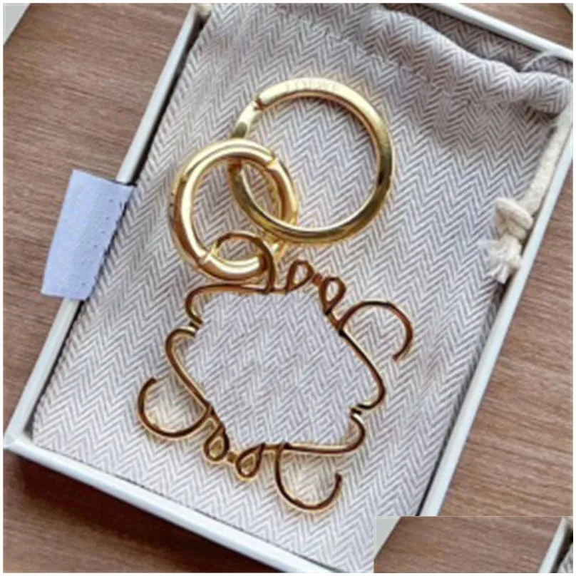 Fashion Luxury Key Designer Carabiner Car Keychains Mens Anagram Pendants Chain Lover Couple Bags Metal Keyrings Sier Gold Drop Deliv Dhinu