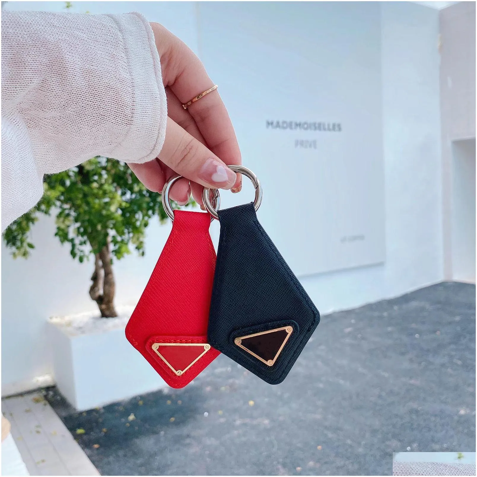 Fashion Luxury For Designer  Keychains Airtags Tracking Device Case Pu Leather Antilost Keychain Portable Hook Candy Color Prote Dhjac