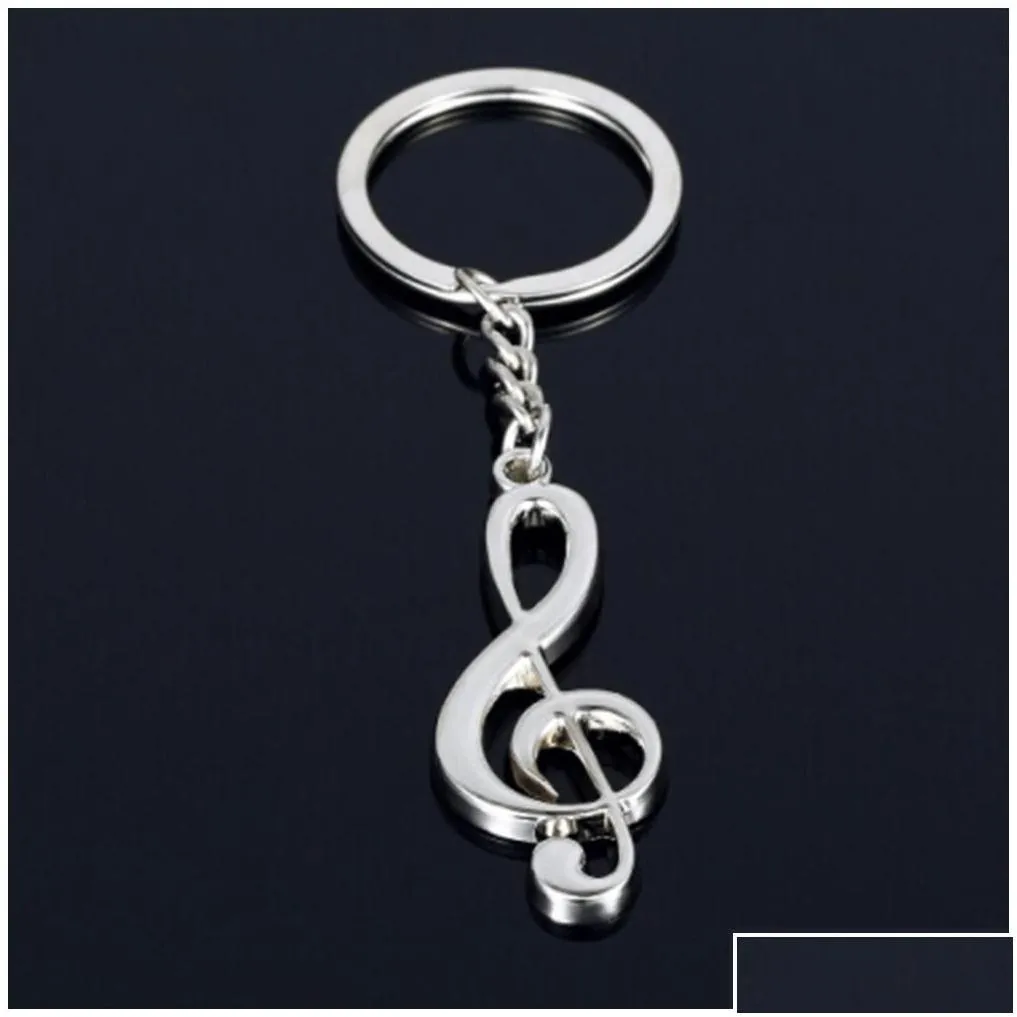 Keychains Lanyards New Key Chain Ring Sier Plated Musical Note Keychain For Car Metal Music Symbol Chains Drop Delivery Fashion Access