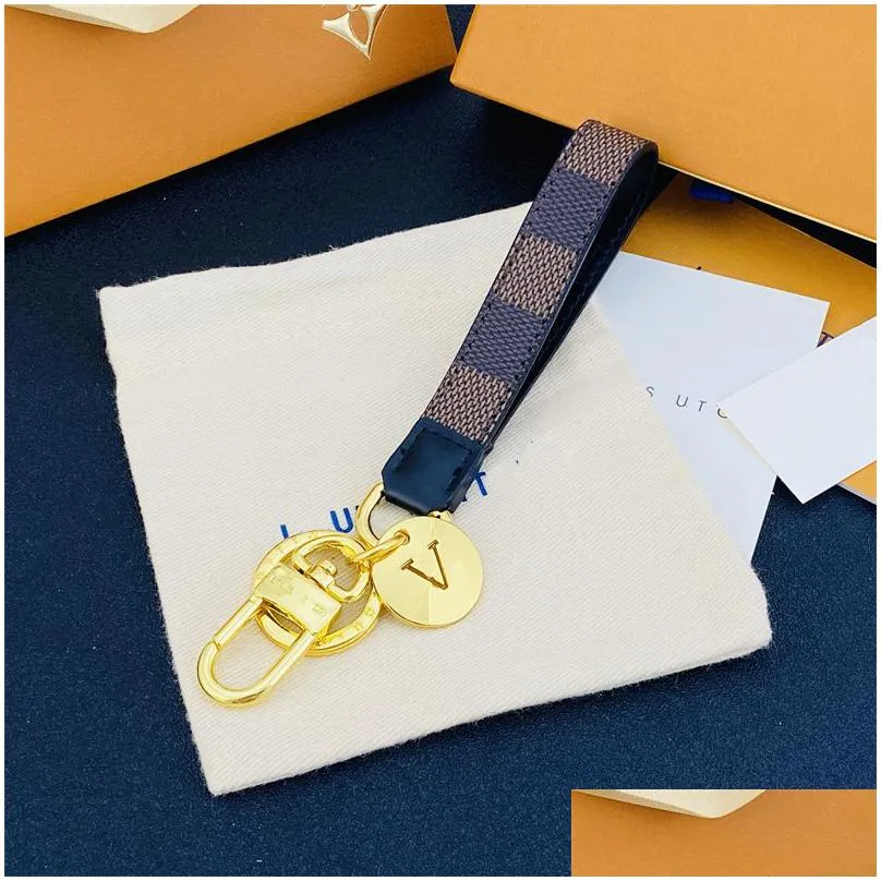 Fashion Luxury Keychain Love Gifts Lover Designer Brand Lanyards For Keys New Women Men Gold Leather Car Girls Bag Classic Pattern Dr Dhl8M