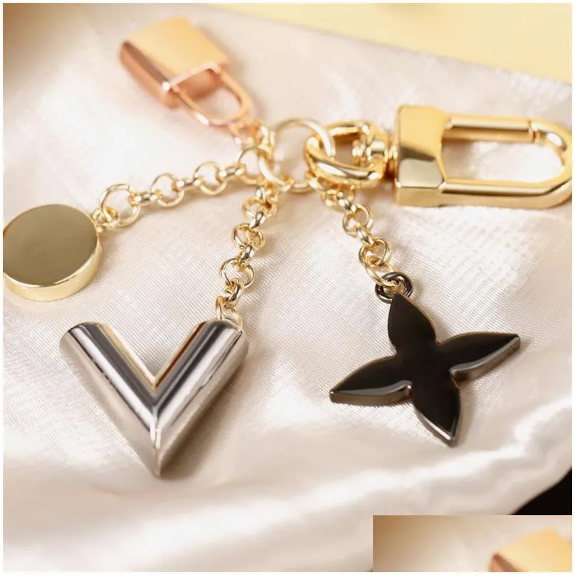 Fashion Luxury Keychains Men Designer Car Key Chain Women Bags Lovers Keyrings Golden Buckle Chains Letters Lock Drop Delivery Dhlla