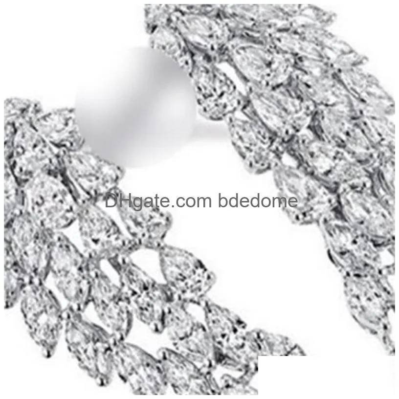 Wedding Rings Sparkling Vintage Fashion Jewelry 925 Sterling Sier Fl Marquise Cut White Diamond Eternity Wing Wedding Feather Adjusta Dh4Wm