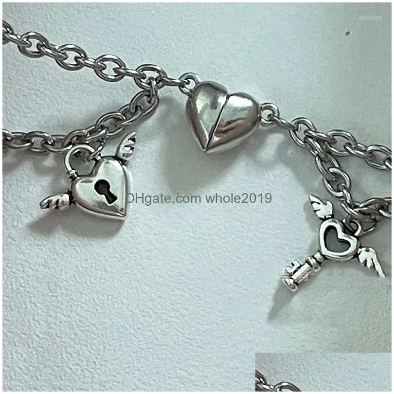 Charm Bracelets 1Pair Couple Magnetic Bracelet Heart Shaped Stainless Steel Angel Wing Lock Love Magnet Jewelry Drop Delivery Dhg7L