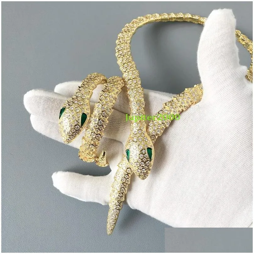 designer collection style dinner party choker neckhole necklace bracelet settings full diamond plated gold green eyes snake serpent snakelike shape jewelry