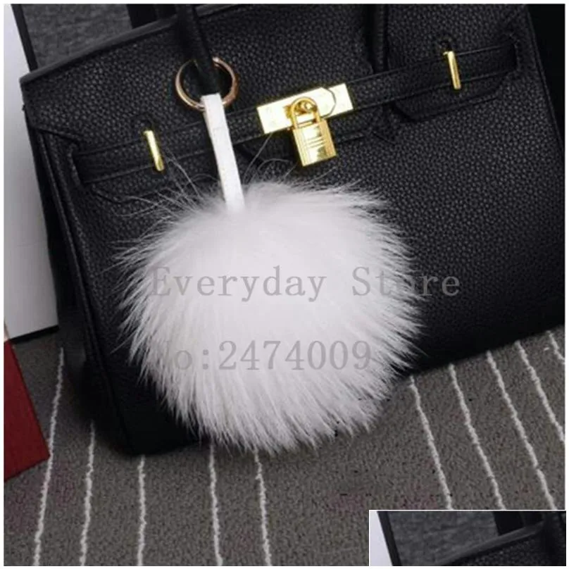 keychains lanyards luxury 15cm fluffy raccoon fur ball real key chains pompom pompon keyring charm women bag pendant 221119